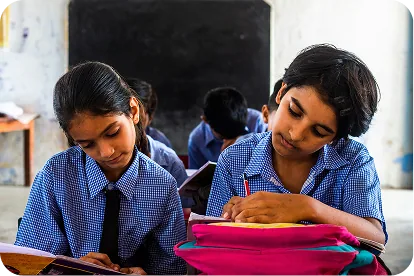 Children using tablets in a digital learning classroom